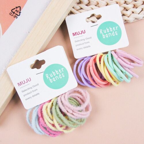 Box of twenty colorful children's rubber bands