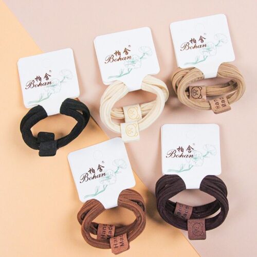 Two simple labeled cotton rubber bands