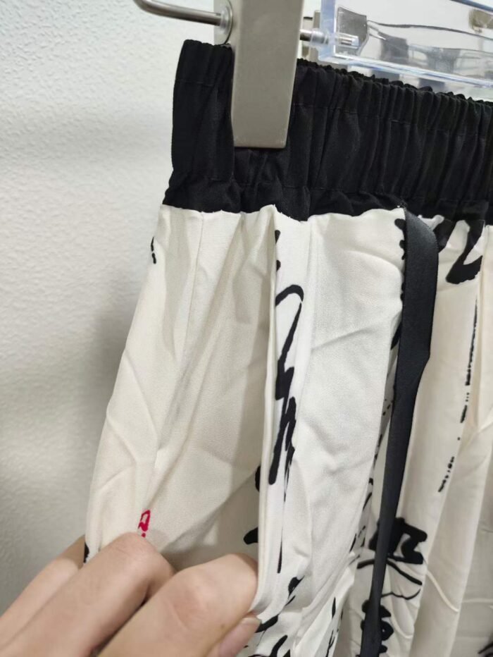 2024 New summer style slim casual pants for women with calligraphy and Chinese style streamer design straight wide leg pants - Tradedubai.ae Wholesale B2B Market