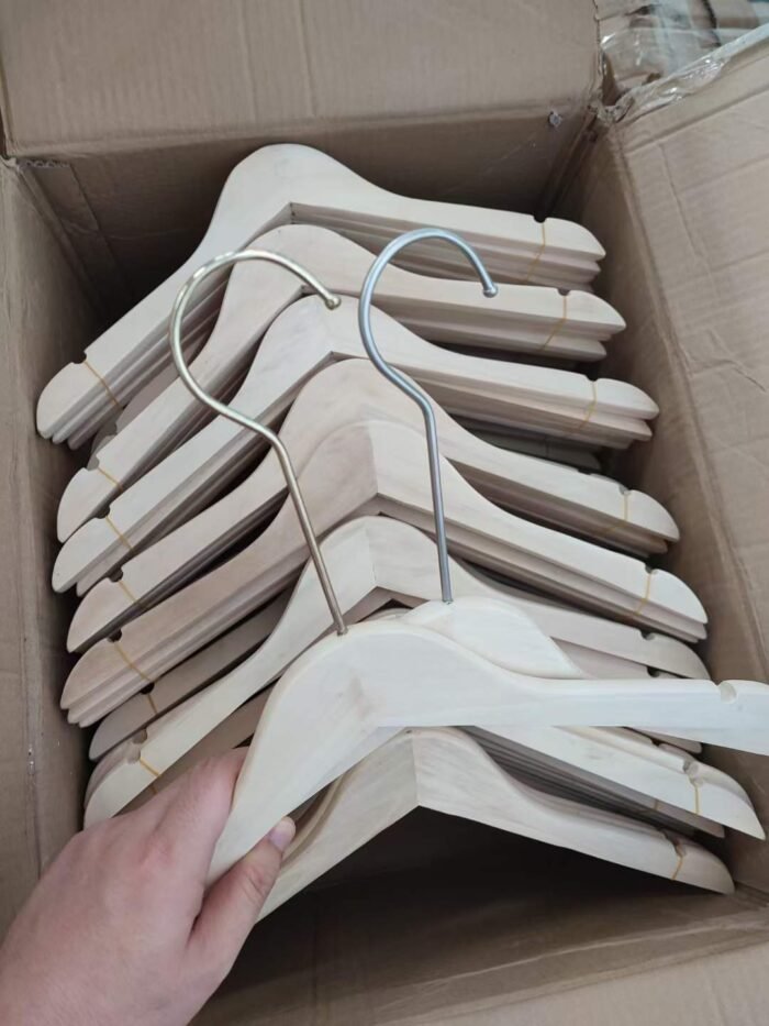 High-quality wooden clothes hangers and trouser clips for adults - Tradedubai.ae Wholesale B2B Market