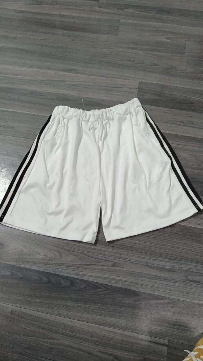 Loose three-striped sports and casual mid-length pants for men and women - Tradedubai.ae Wholesale B2B Market