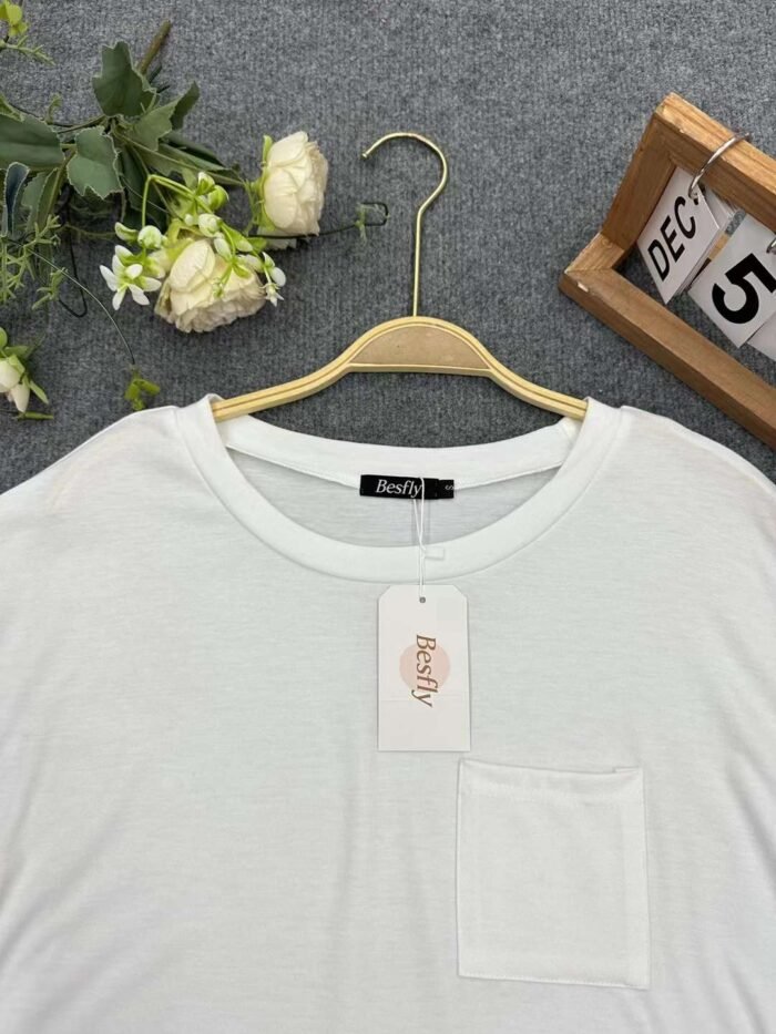 Solid color slit round neck mid-length T-shirts - Tradedubai.ae Wholesale B2B Market