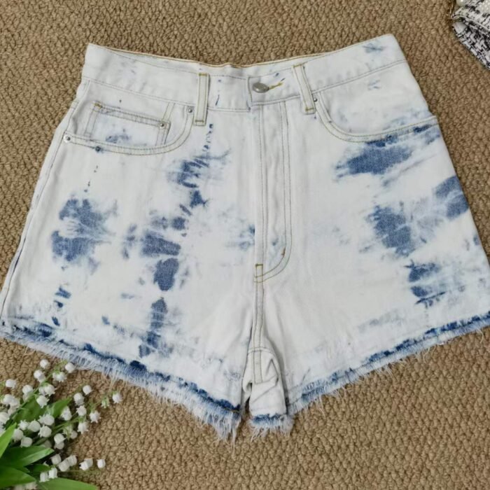 Splashed ink tie-dye raw edge slimming and leg-lengthening mid-waist washed cotton denim shorts - Tradedubai.ae Wholesale B2B Market