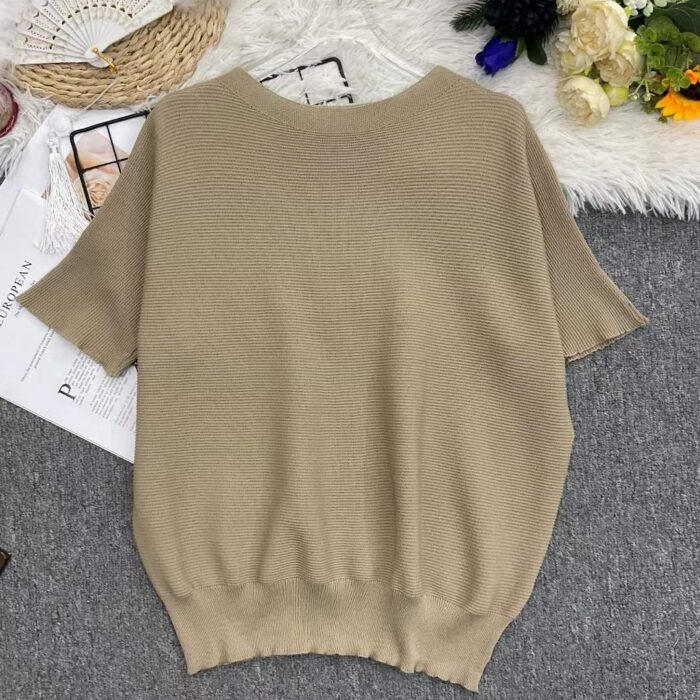 Womens loose-fitting knitted T-shirt with dropped shoulders - Tradedubai.ae Wholesale B2B Market