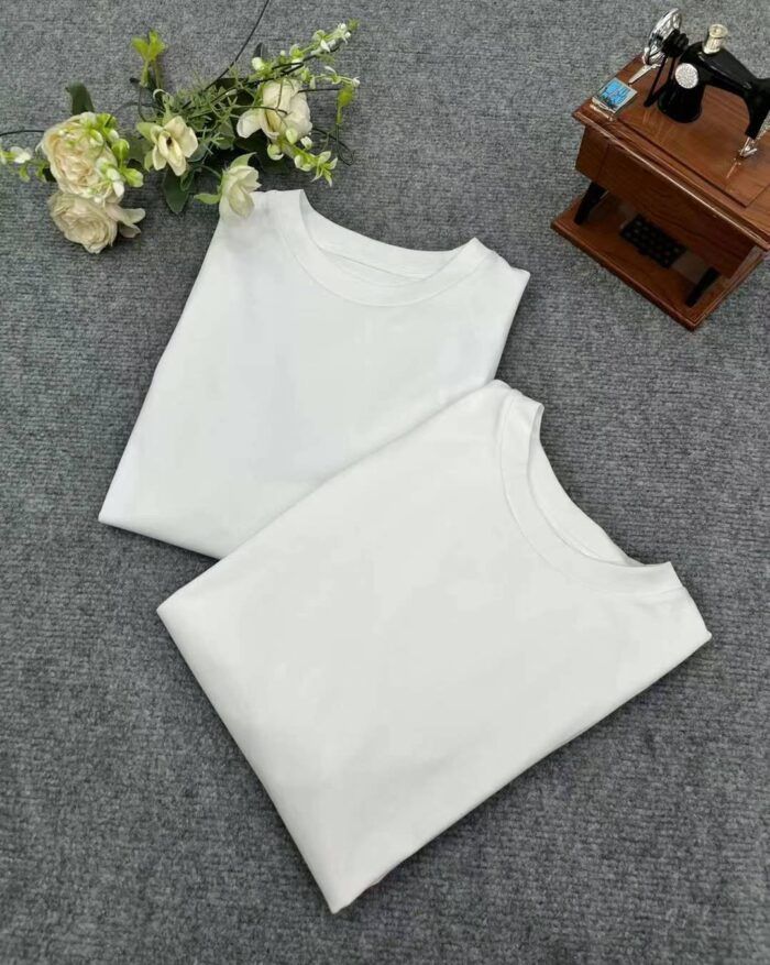 Stylish round neck solid color T-shirts with three-dimensional shoulders - Tradedubai.ae Wholesale B2B Market